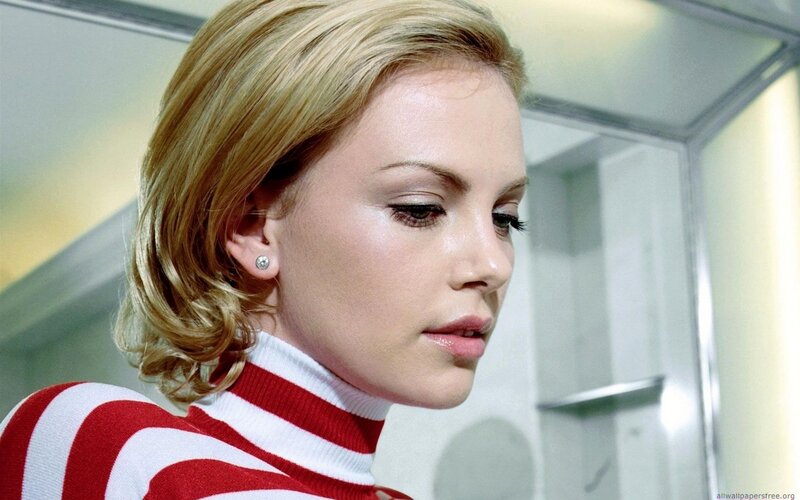 Woman in Striped Sweater — Red, Serious, Photograph