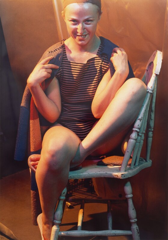 woman in striped swimsuit
