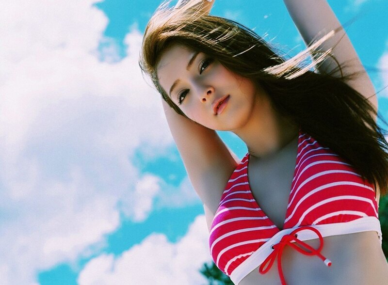 woman in striped swimsuit