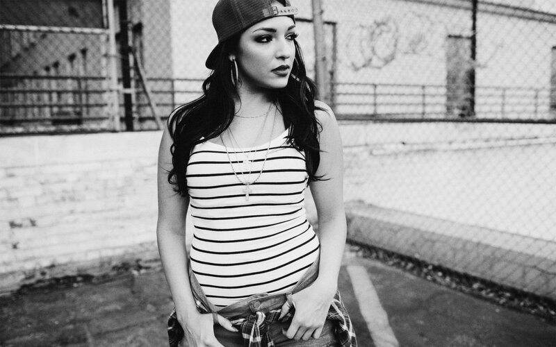 woman in striped top and cap