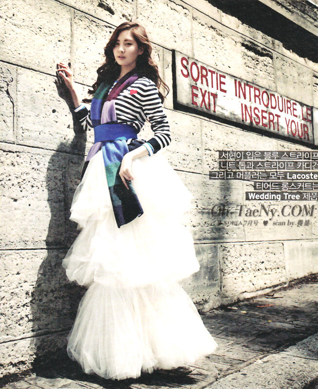 woman in striped top and tulle skirt