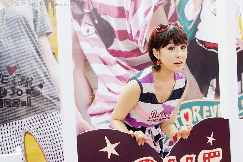 woman in striped top at event