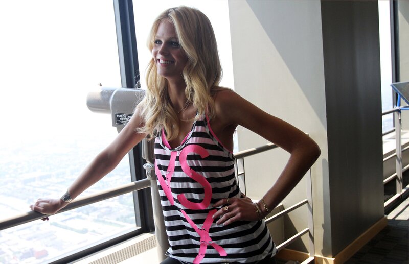 Woman in striped top at observation deck