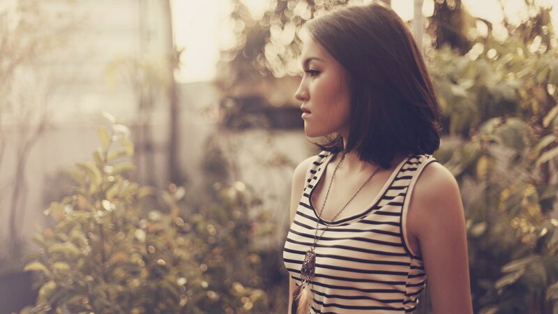 Woman in Striped Top — Brown, Contemplative, Sunset