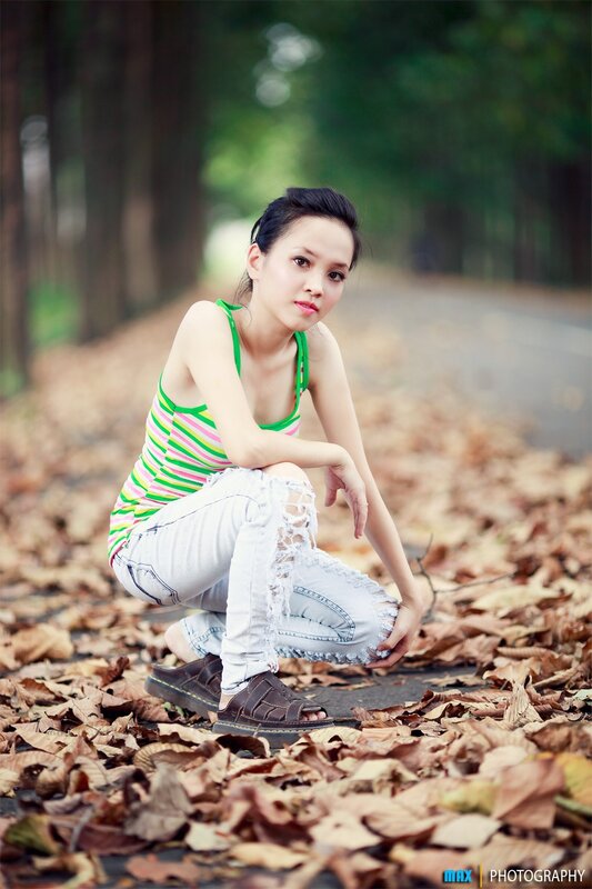 woman in striped top crouching