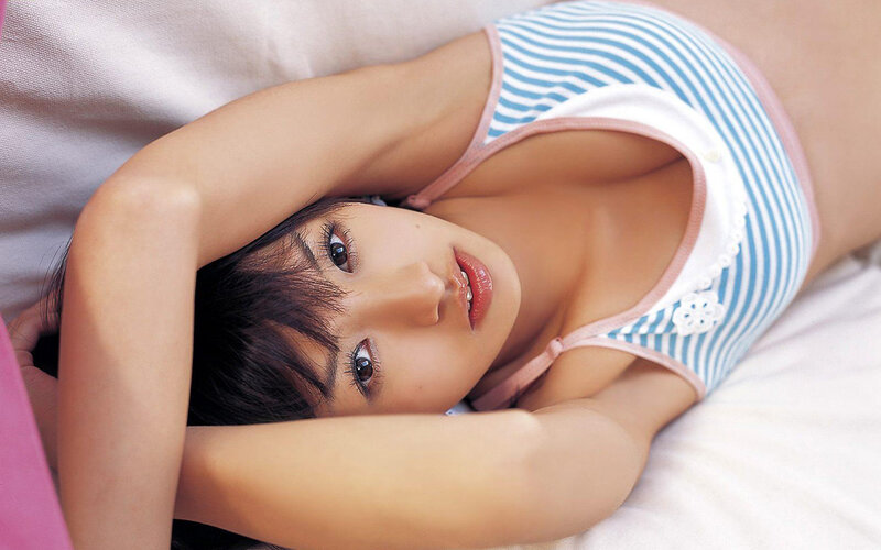 woman in striped top lying down