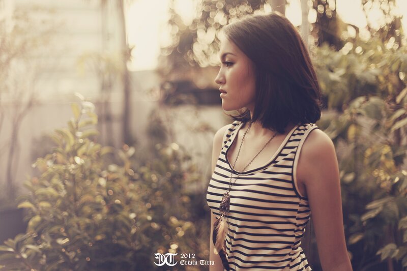 woman in striped top outdoors