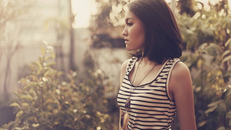 woman in striped top outdoors