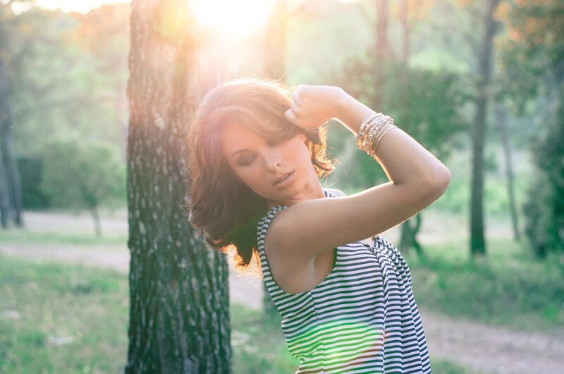 woman in striped top outdoors