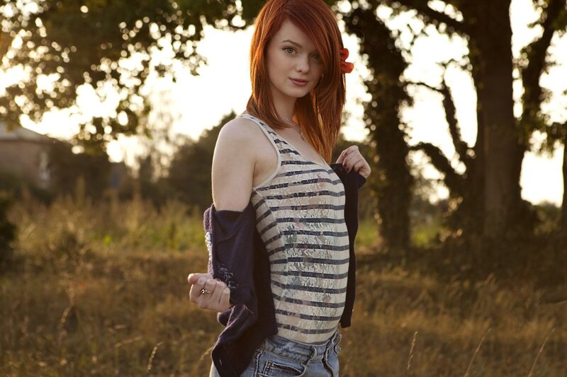 woman in striped top outdoors