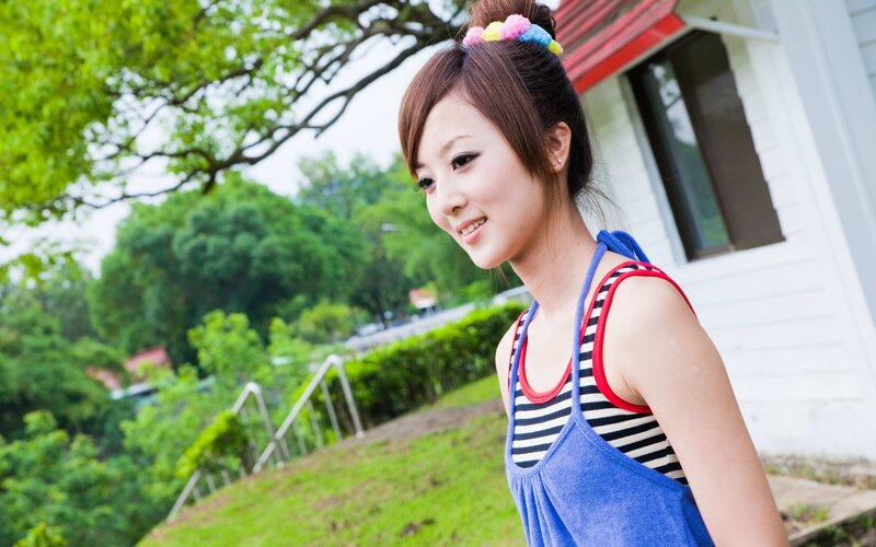 woman in striped top outdoors