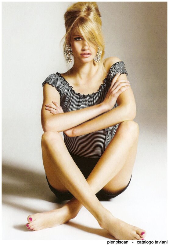 woman in striped top sitting