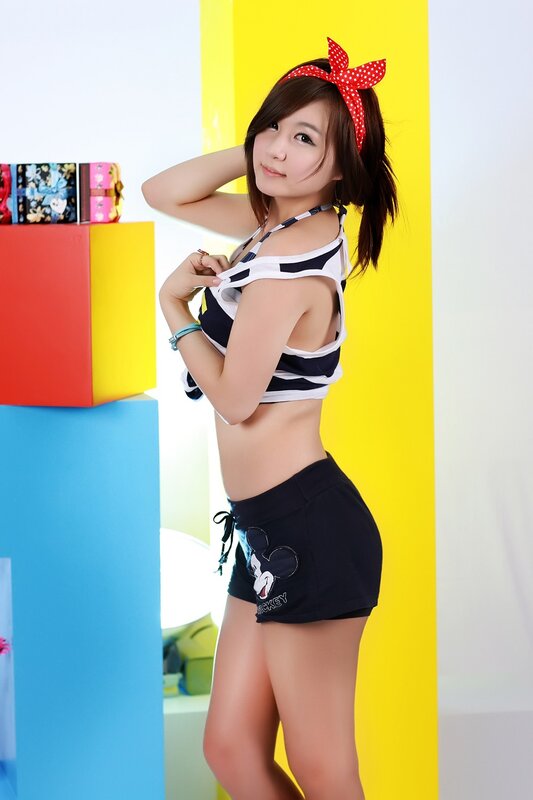 Woman in Striped Top — Yellow, Playful, Photograph