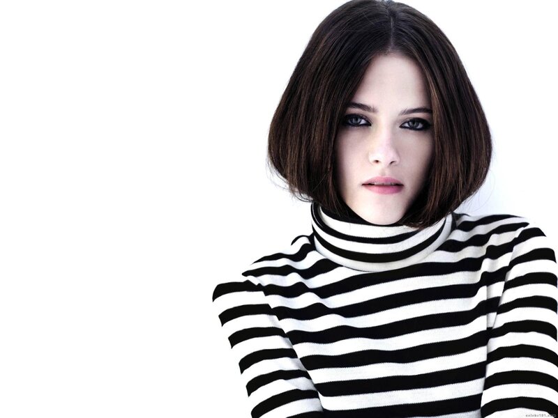 woman in striped turtleneck