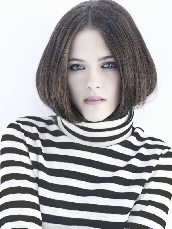 woman in striped turtleneck