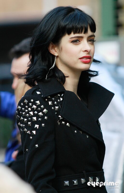 woman in studded coat