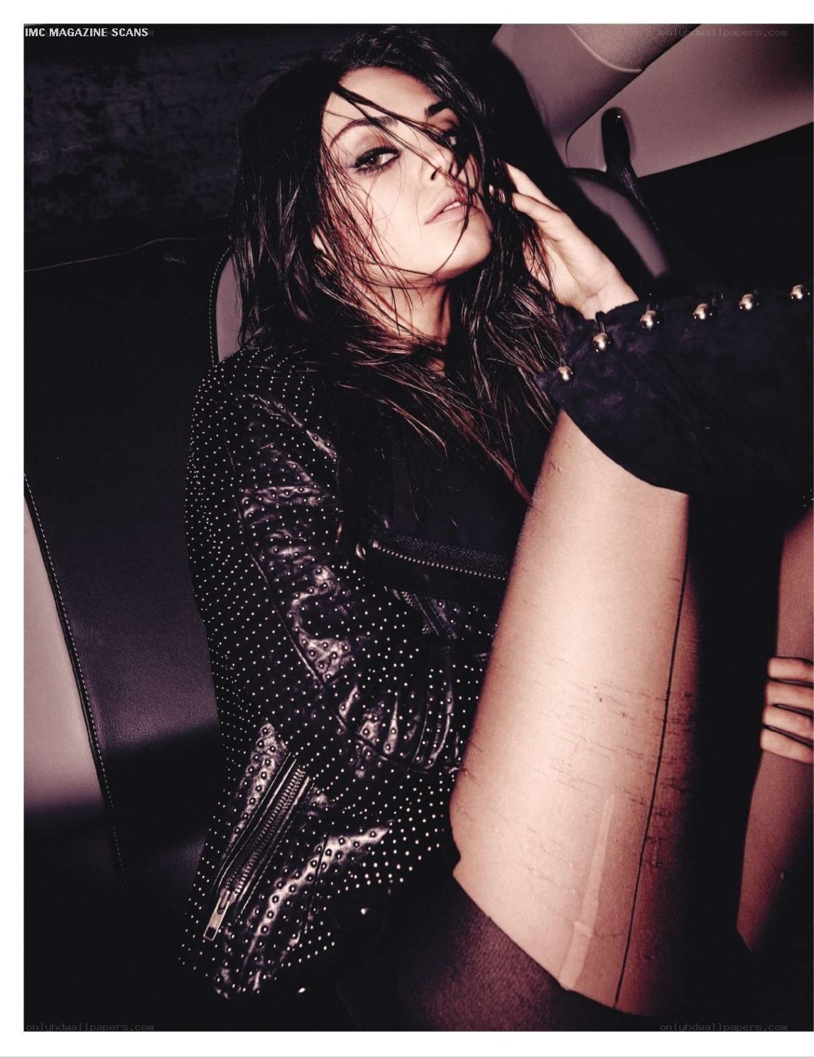 woman in studded jacket