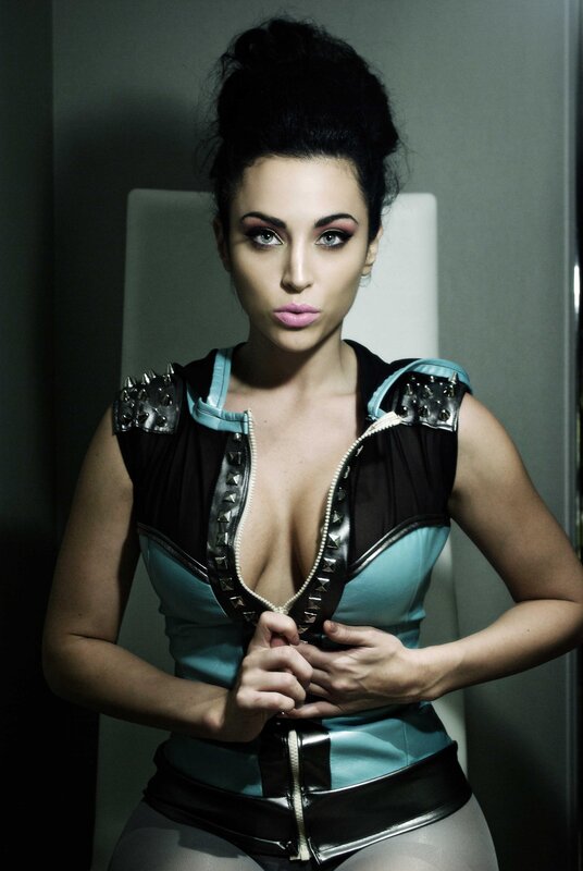 woman in studded outfit