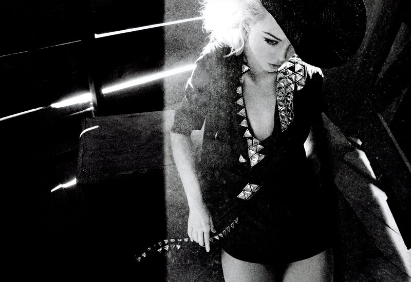 woman in studded outfit