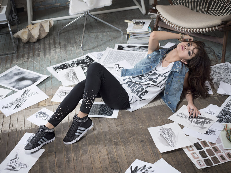 woman in studio with sketches