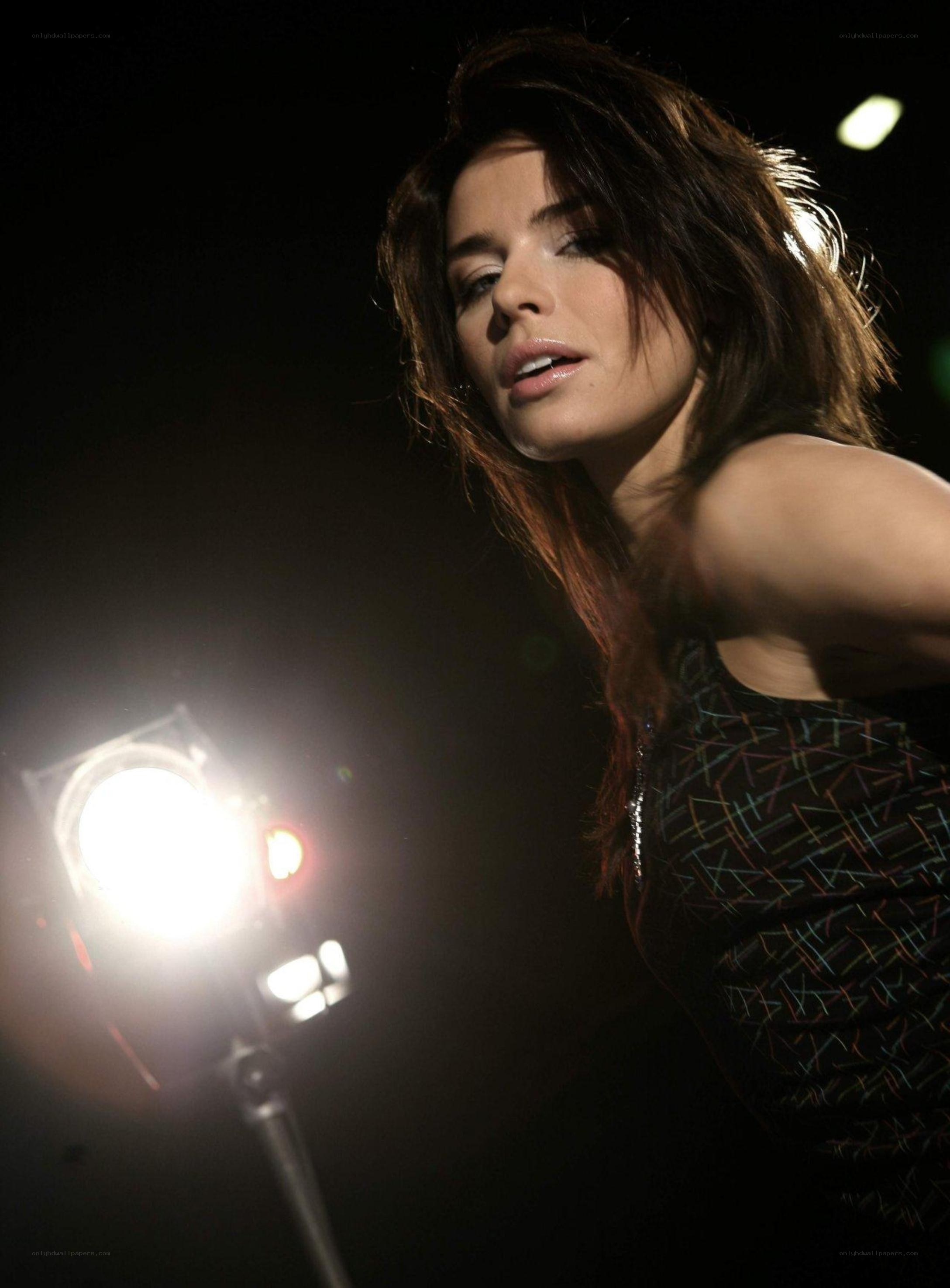 woman in studio with spotlight