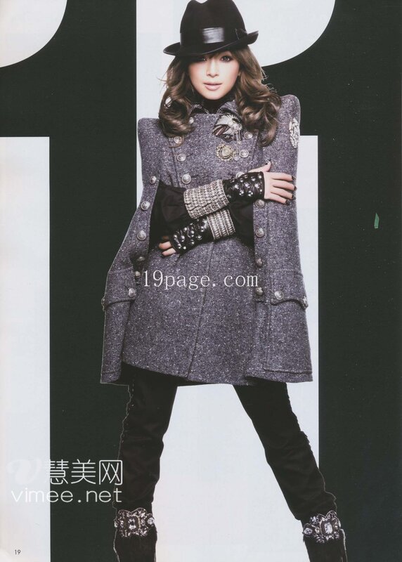 woman in stylish coat and hat
