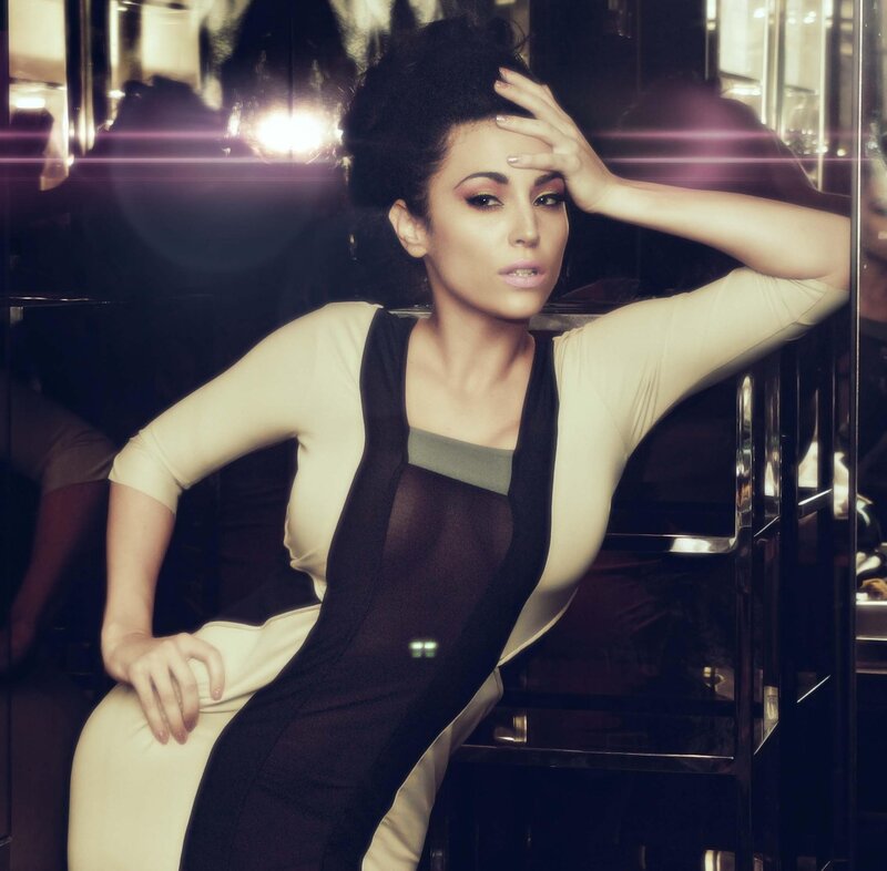 woman in stylish dress posing
