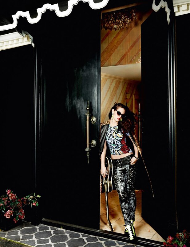 woman in stylish outfit at doorway