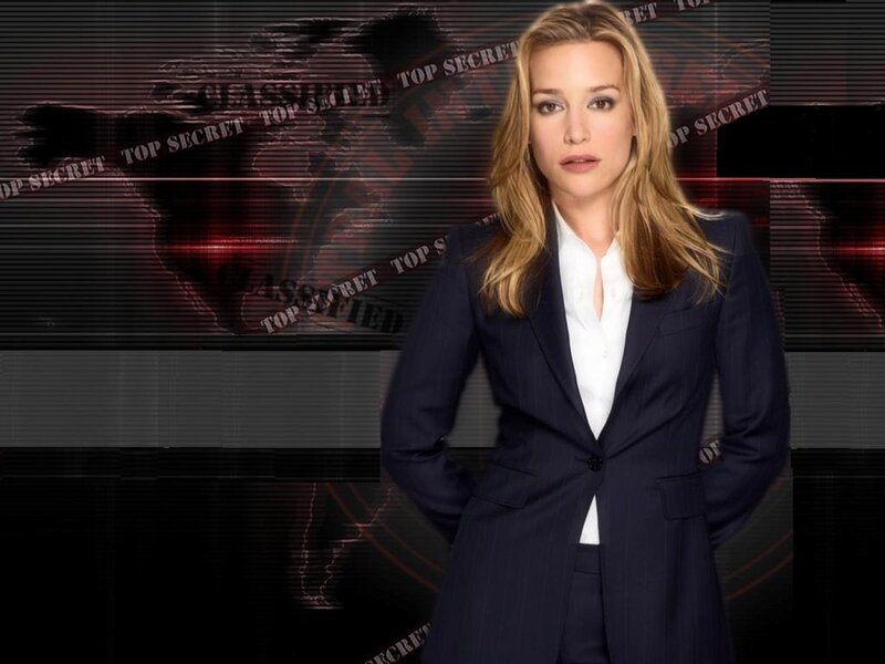 Woman in Suit — Black, Serious