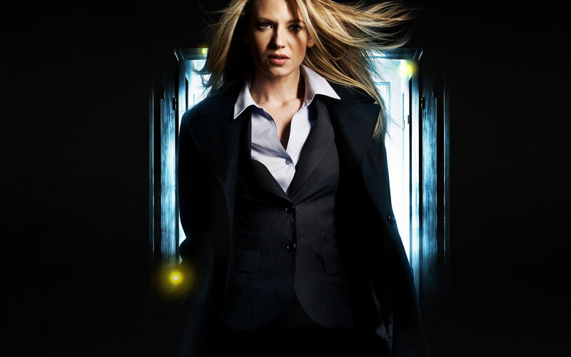 woman in suit with glowing door