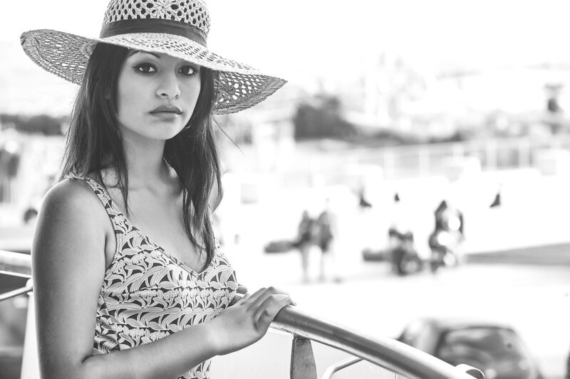 woman in sun hat on boat