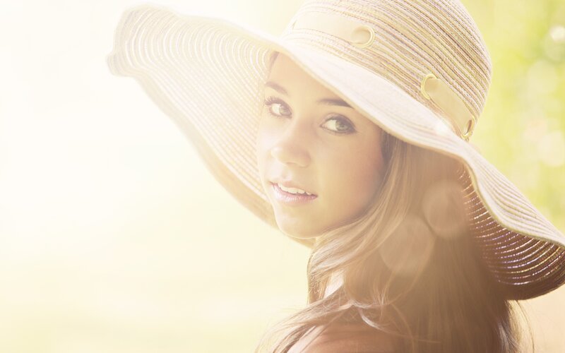 woman in sun hat outdoors