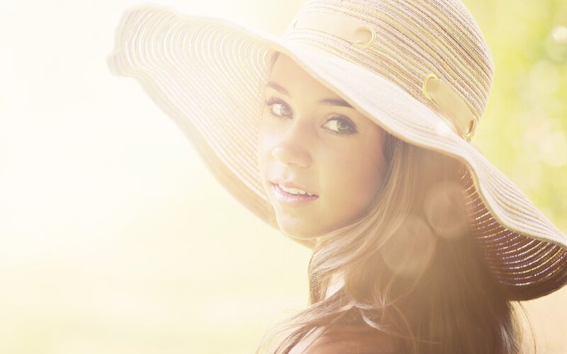 woman in sun hat outdoors