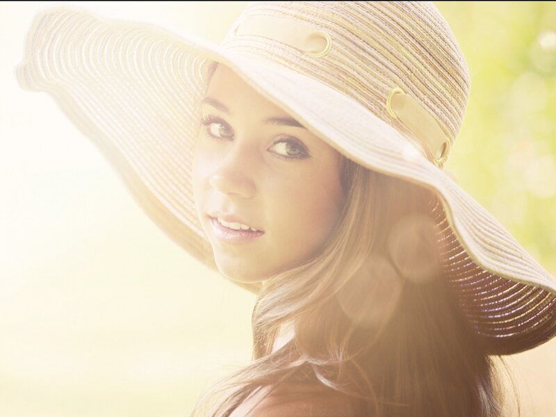 woman in sun hat outdoors