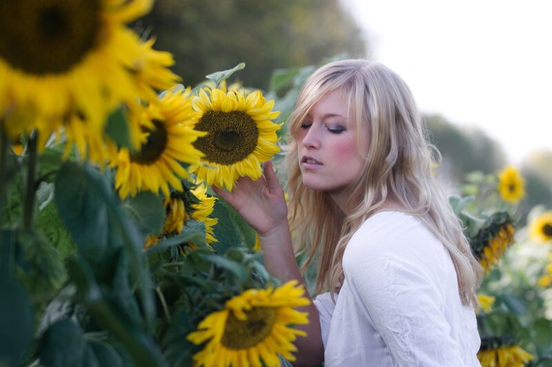 woman in sunflower field