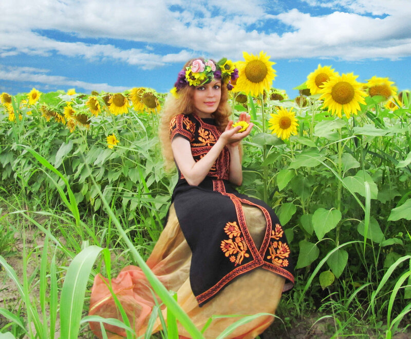 Woman in sunflower field
