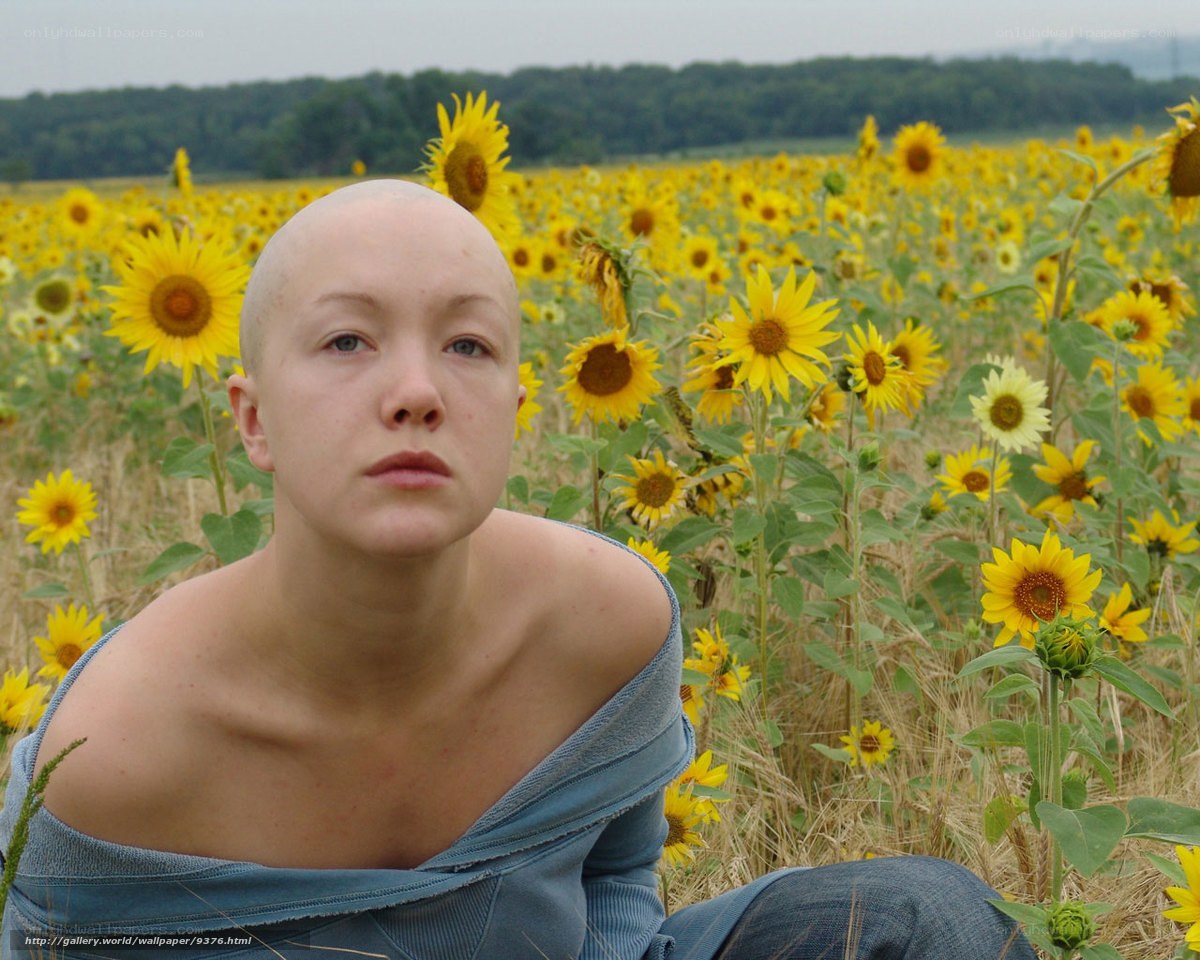 woman in sunflower field