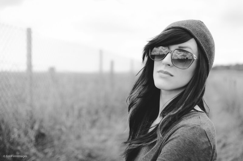 woman in sunglasses and beanie