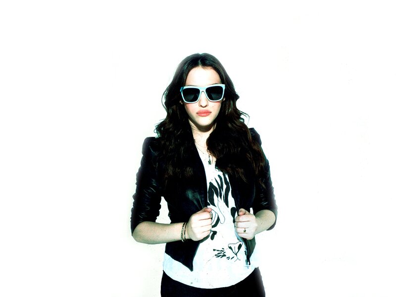 woman in sunglasses and black jacket