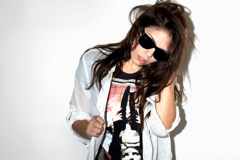 woman in sunglasses and graphic tee