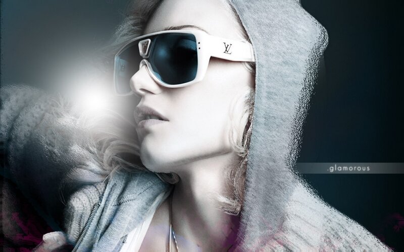 woman in sunglasses and hoodie