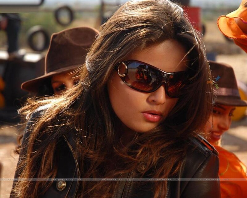 woman in sunglasses and leather jacket