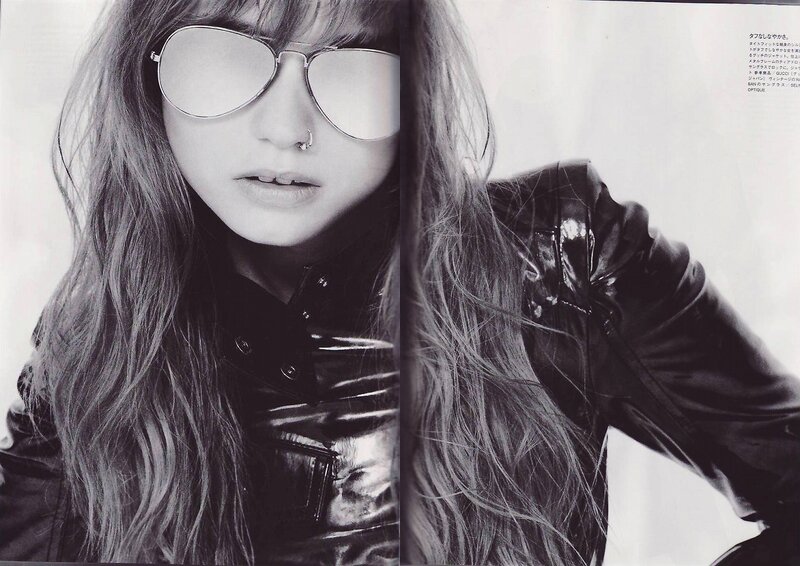 woman in sunglasses and leather jacket
