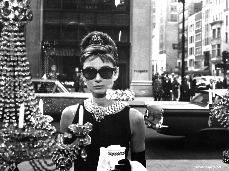 Woman in Sunglasses and Pearls