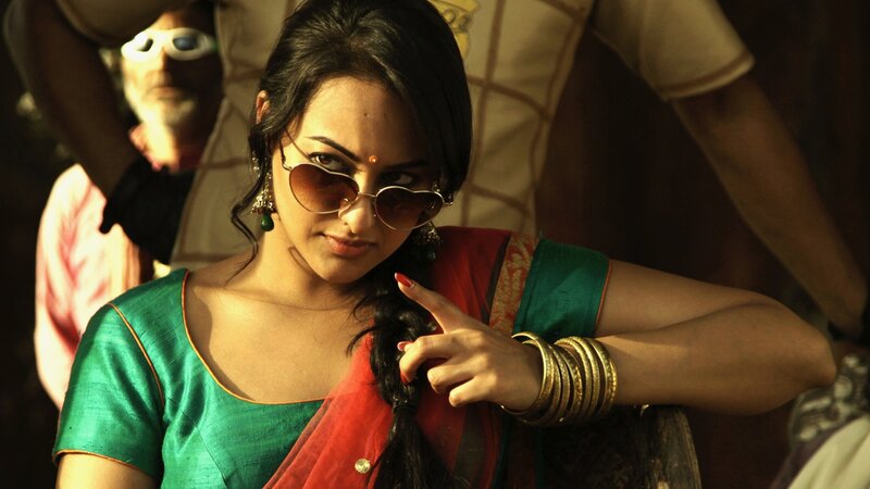 woman in sunglasses and sari