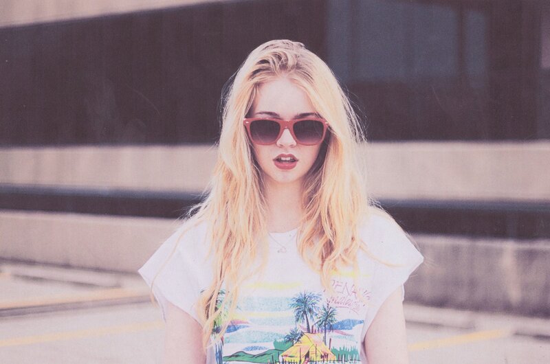 woman in sunglasses and t-shirt
