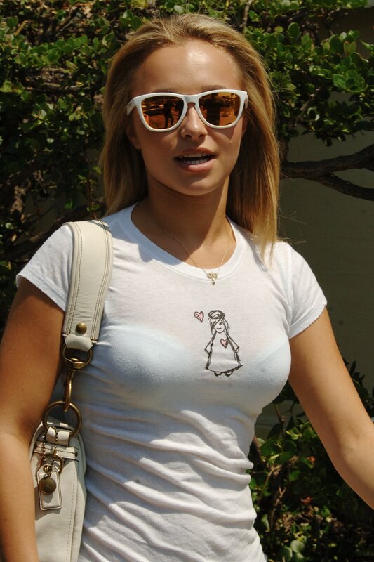 Woman in sunglasses and white t-shirt
