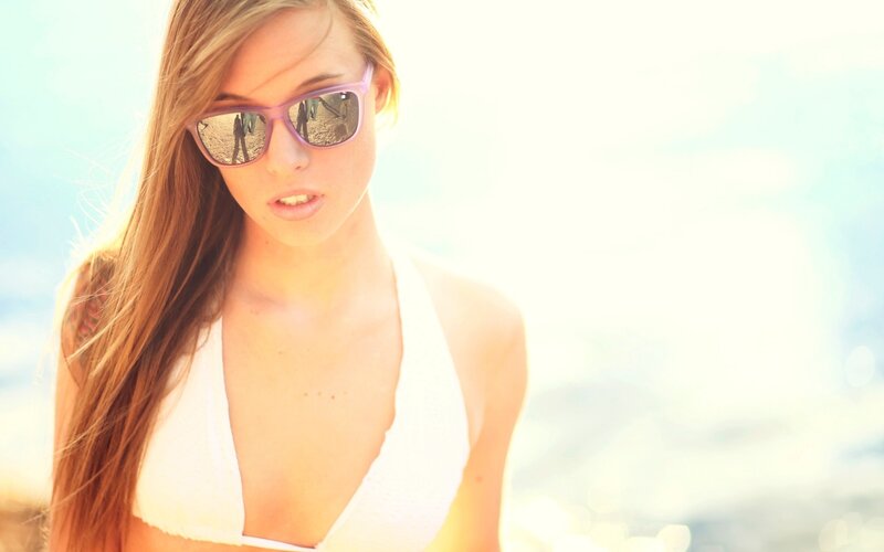 woman in sunglasses at beach