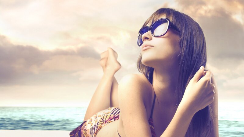 woman in sunglasses at beach