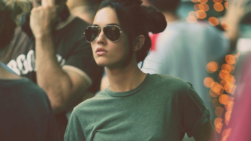 woman in sunglasses at event